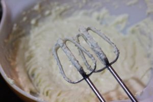 Mixing batter for Mini Cheesecakes @ bestwithchocolate.com