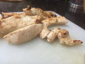 Cutting up Caesar Chicken