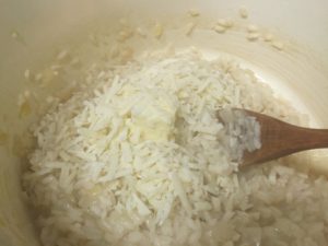 Adding finishing cheese and butter to Risotto @ bestwithchocolate.com