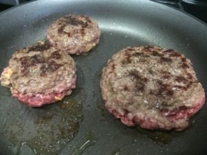 Cooking the Juicy Lucy Burger @ bestwithchocolate.com