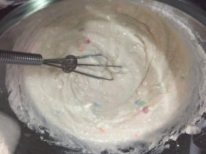 Mixing up batter for Cake Batter Pancakes @ bestwithchocolate.com