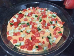 Hummus topped with tomatoes and cucumbers for a Mediterranean Dip @ bestwithchocolate.com
