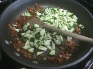 Making the beans and zucchini for Huevos Rancheros Quesadillas @ bestwithchocolate.com