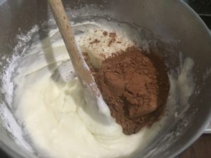 Mixing chocolate icing for Triple Peanut Butter Bars @ bestwithchocolate.com