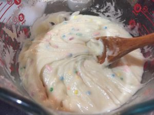 Mixing batter for Funfetti Fudge @ bestwithchocolate.com