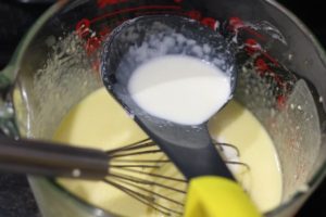 Adding cream to form custard for Vanilla Honey Soft Serve @ bestwithchocolate.com