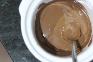 Melted chocolate for Dulche de Leche Cups @ bestwithchocolate.com
