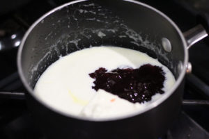 Cream mixture for Raspberry Chambord Truffles @ bestwithchocolate.com