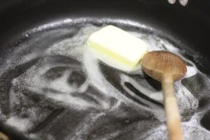 Melting butter for Shrimp Scampi @ tipschocochip.com