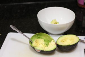 Dicing avocados for Avocado Caprese Salad @ bestwithchocolate.com