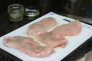Seasoning chicken for Chicken Picatta @ bestwithchocolate.com