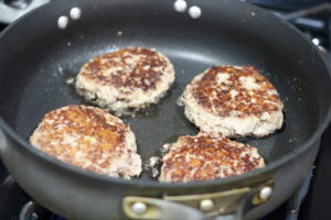 Grilling up burgers for French Onion Burgers @ bestwithchocolate.com