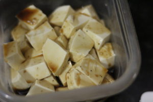 Marinating tofu for Honey Sesame Tofu @ bestwithchocolate.com