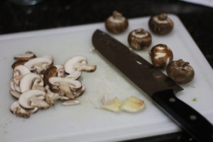 Slicing mushrooms for Garlic Mushrooms @ bestwithchocolate.com