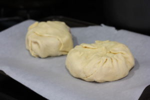 Folding up brie for Brie en Croute @ bestwithchocolate.com
