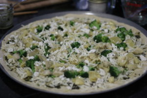 Green Pesto Pizza with artichokes, broccoli, mozzarella and feta cheeses, and pesto @ bestwithchocolate.com