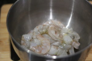 Peeling shrimp for Bang Bang Shrimp @ bestwithchocolate.com