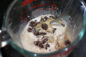 Mixing chocolate topping for Peanut Butter Pie @ bestwithchocolate.com