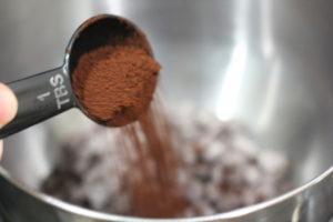 Adding espresso powder to Salted Chocolate Espresso Cookies @ bestwithchocolate.com