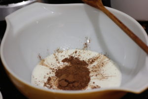Adding cocoa powder to cream for Bailey's Chocolate Mousse @ bestwithchocolate.com