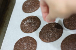 Adding finishing salt to Salted Chocolate Espresso Cookies @ bestwithchocolate.com