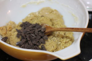 Mixing cookie dough for Perfectly Chewy Chocolate Chip Cookies @ bestwithchocolate.com