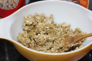 Mixing together cookie dough batter for Oatmeal Cookies @ bestwithchocolate.com