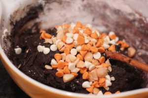 Adding in the chocolate chip goodness to Halloween Mash Cookies @ bestwithchocolate.com