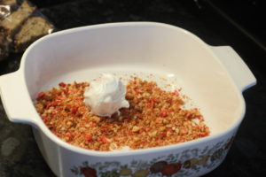 Adding the crunch to Strawberry Crunch Cakeballs @ bestwithchocolate.com