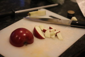 Chopping apples for Caramel Apple Sangria @ bestwithchocolate.com
