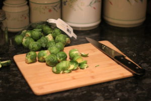 Chopping brussel sprouts for Buttery Brussel Sprouts and Ravioli @ bestwithchocolate.com