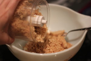 Crushing cinnamon bun oreos for Cinna-bun Truffles @ bestwithchocolate.com