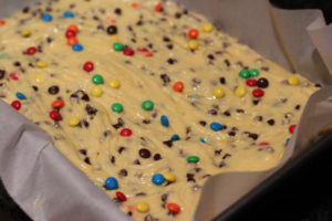 Topping bars with extra mini m&ms for Cake Box Cookie Bars @ bestwithchocolate.com