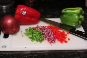 Chopping up vegetables for Lightened up Macaroni Salad @ bestwithchocolate.com
