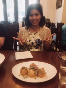The birthday girl with our first appetizer, yuquitas rellenas de cangrejo @ bestwithchocolate.com