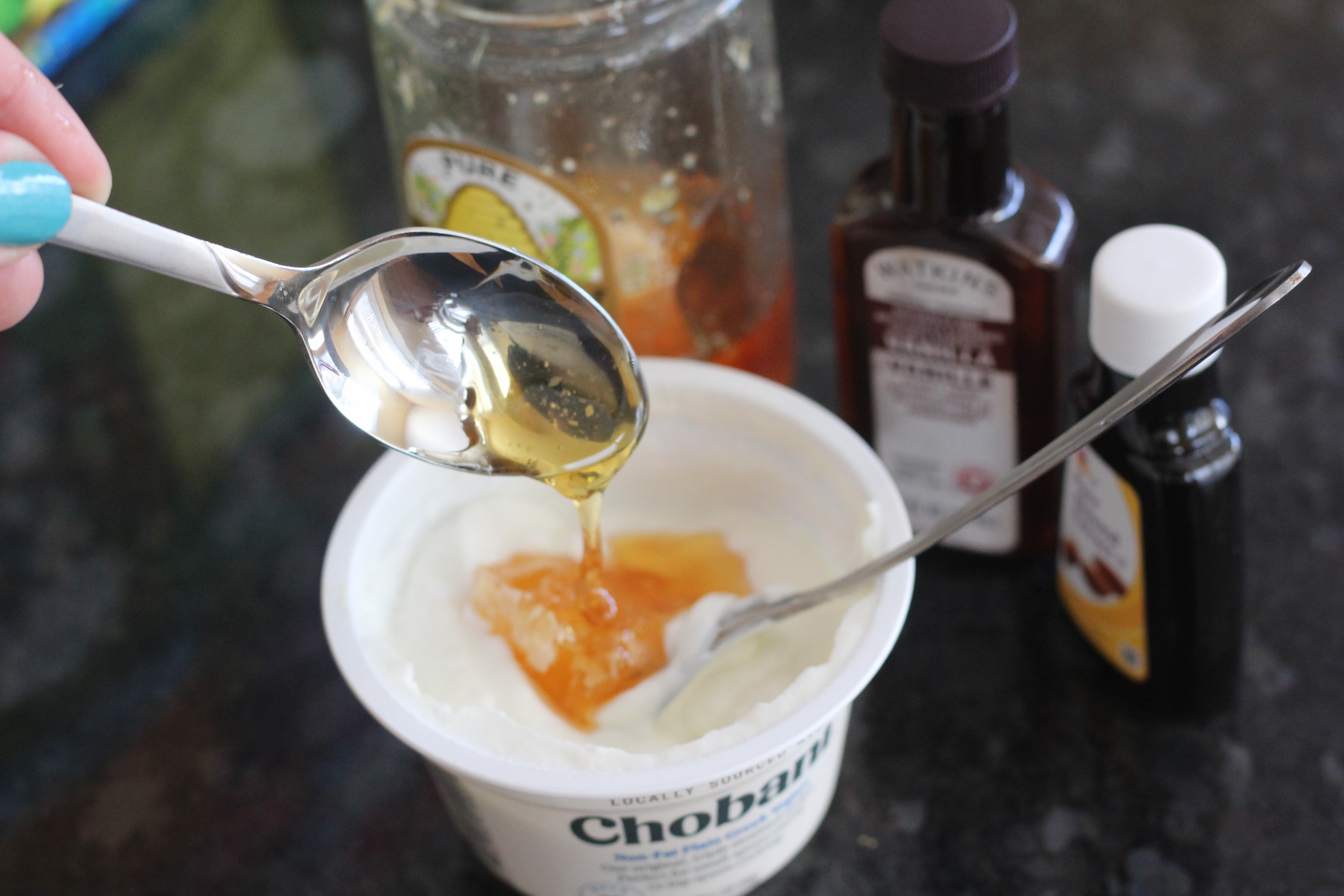 Adding honey to Cookie Dough Protein Yogurt @ bestwithchocolate.com