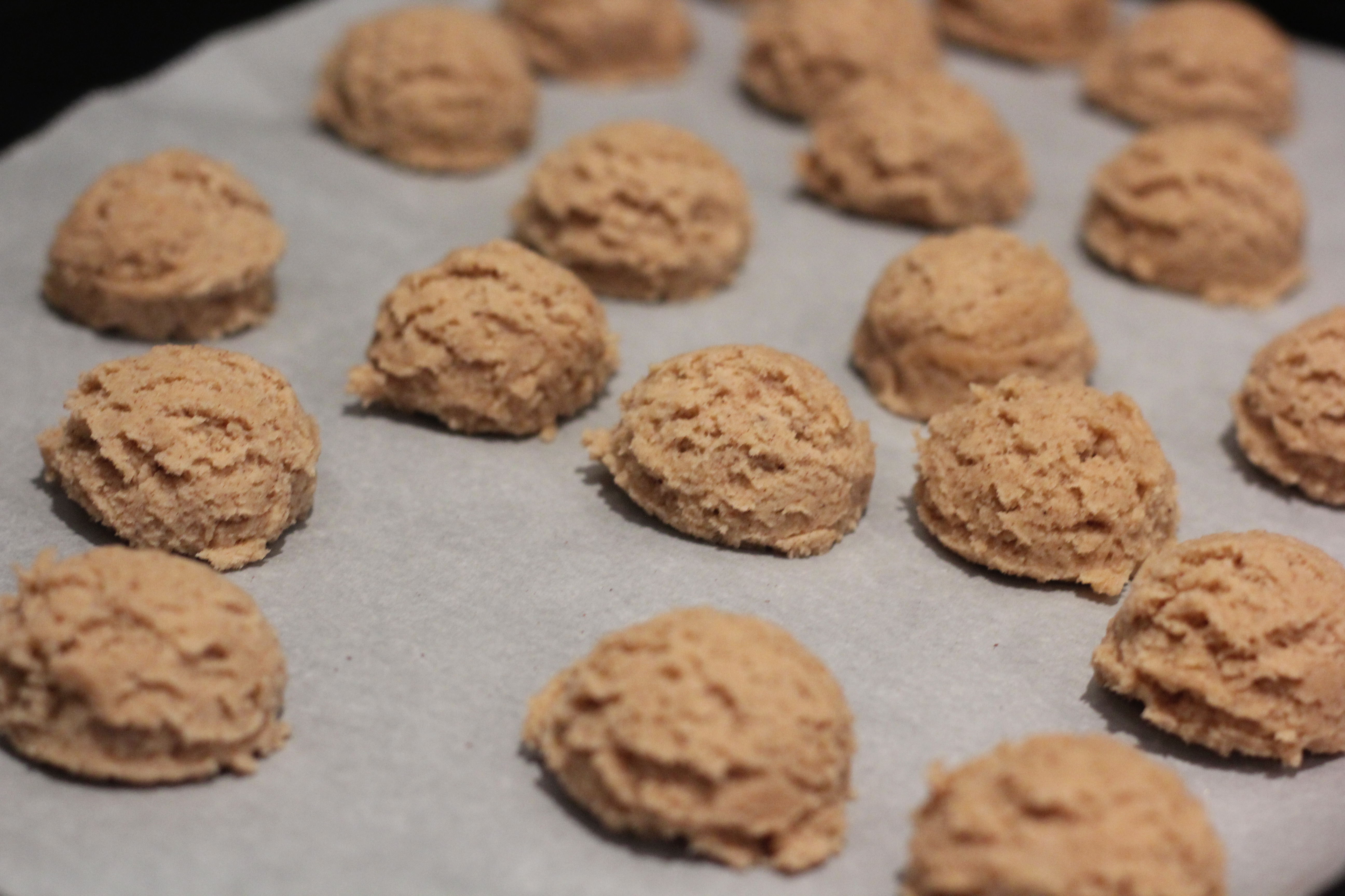 Scooping cookie dough for Snickerdoodle Cookies @ bestwithchocolate.com