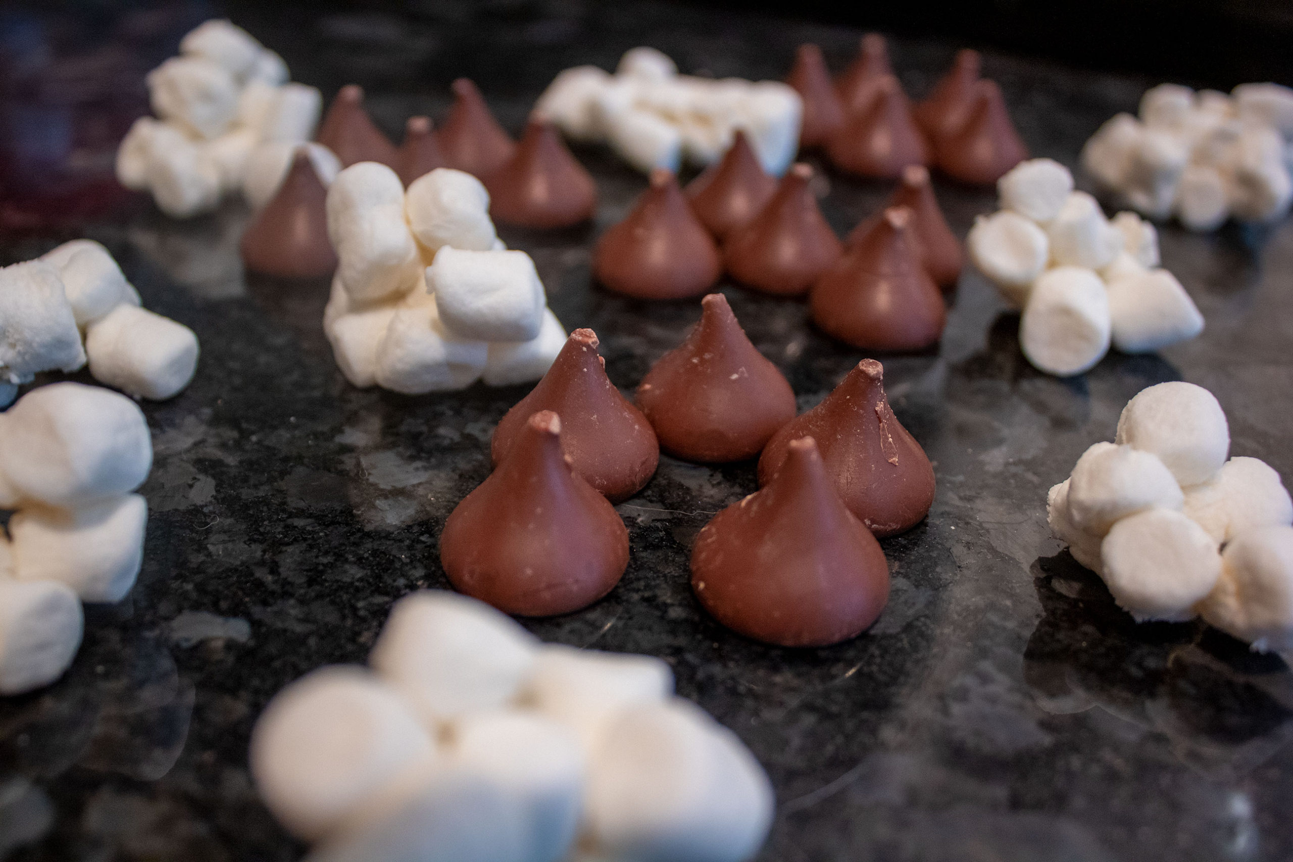 Unwrapped kisses and marshmallows for S'mores Kiss Cookies @ bestwithchocolate.com