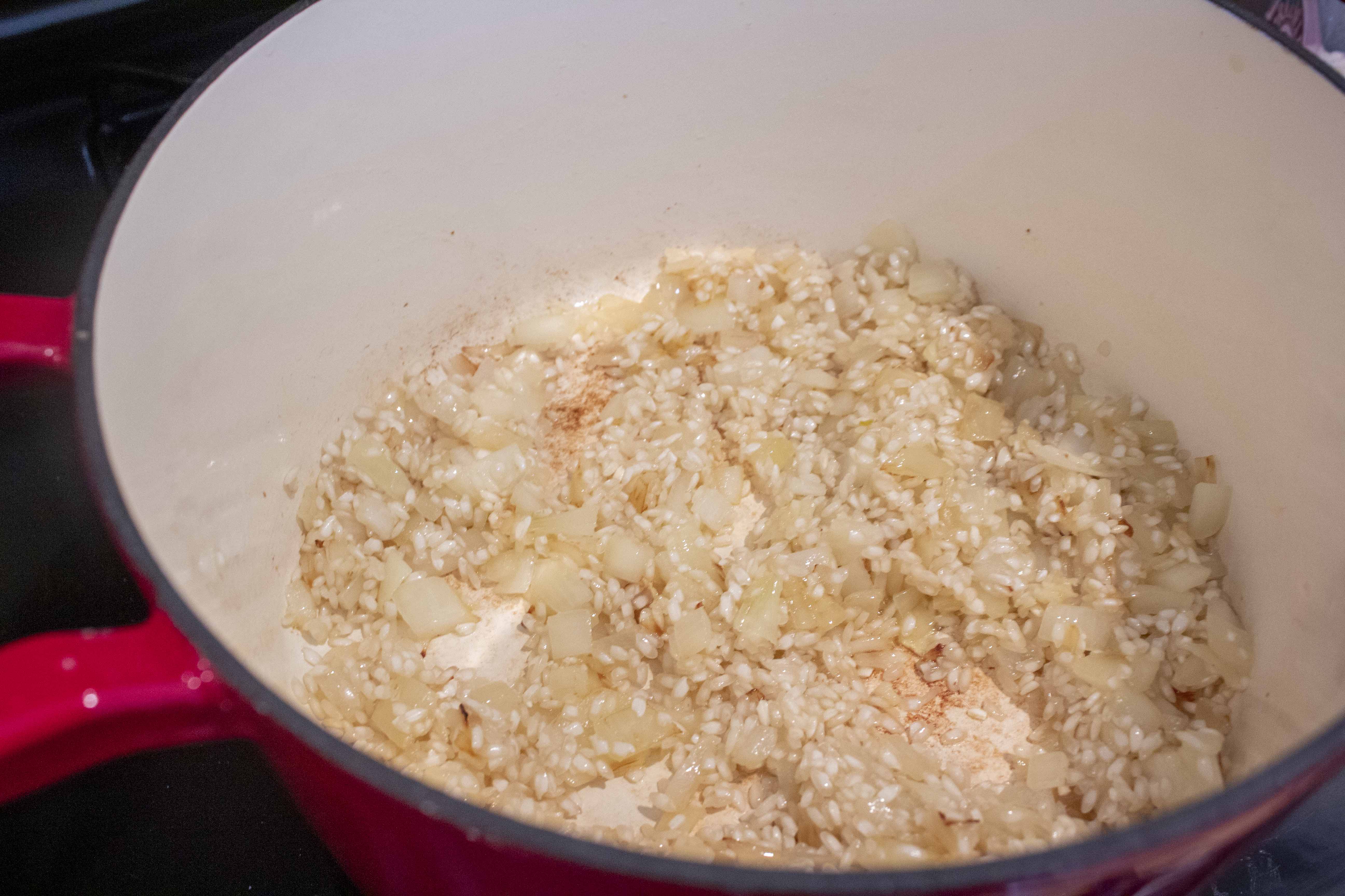 Toasting arborio rice for Lightened Up Risotto @ bestwithchocolate.com