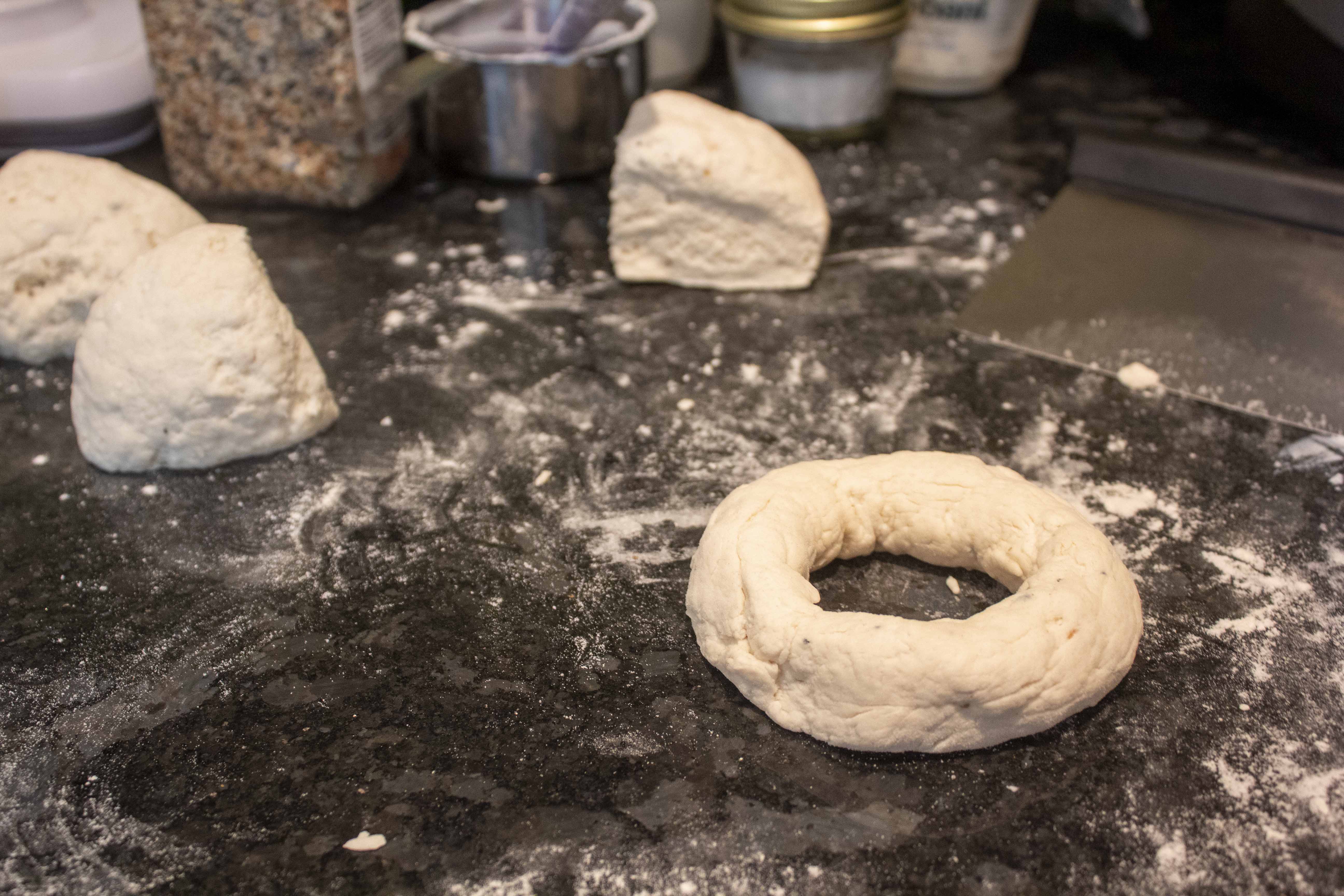 Forming dough into a ring for Quarantine Bagels @ tipsychochochip.com