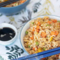 Vegetable Fried Rice close up with soy sauce and chopsticks