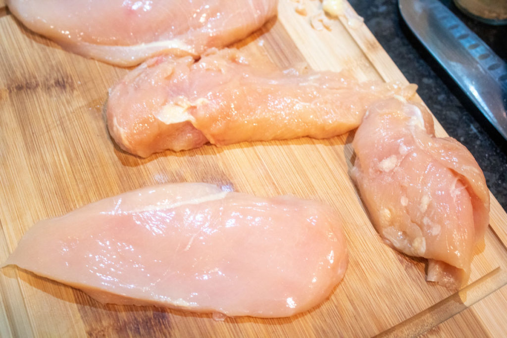 Slicing chicken for rosemary cream chicken