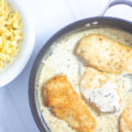 Rosemary cream chicken in the pan with butter noodles