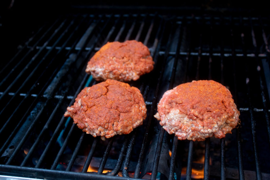 grilling burgers with the rub