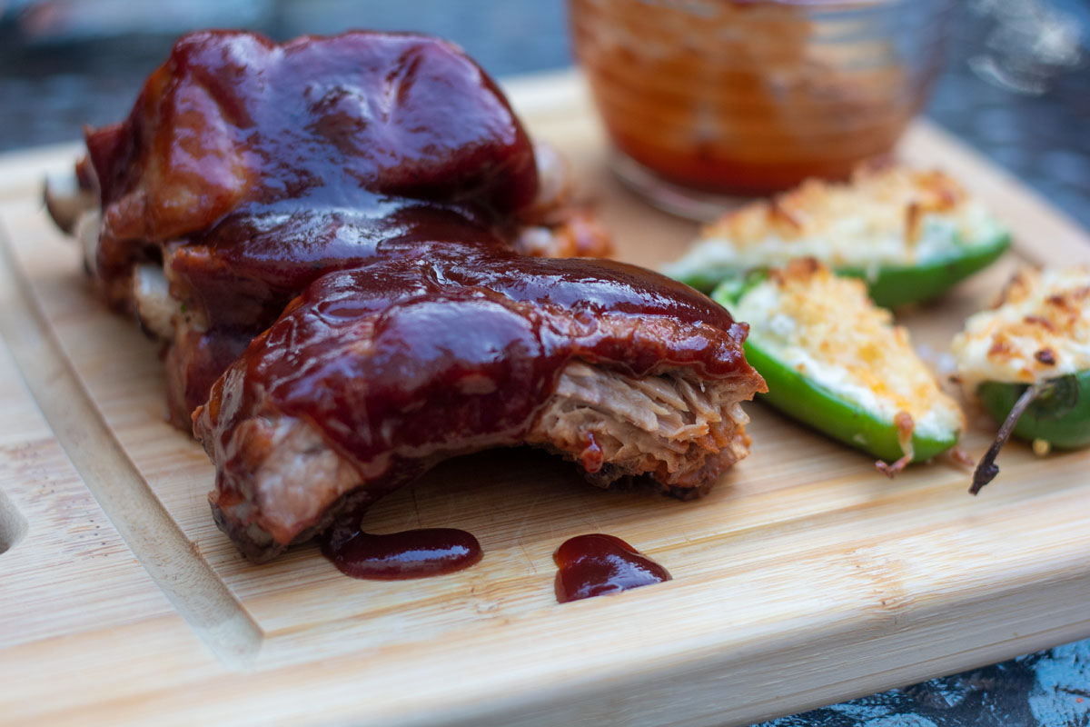 Slow cooker baby back ribs, jalapeno poppers, and BBQ sauce