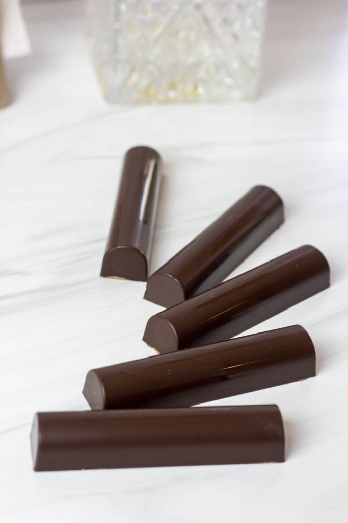 artful cascading arrangement of tempered chocolate bars