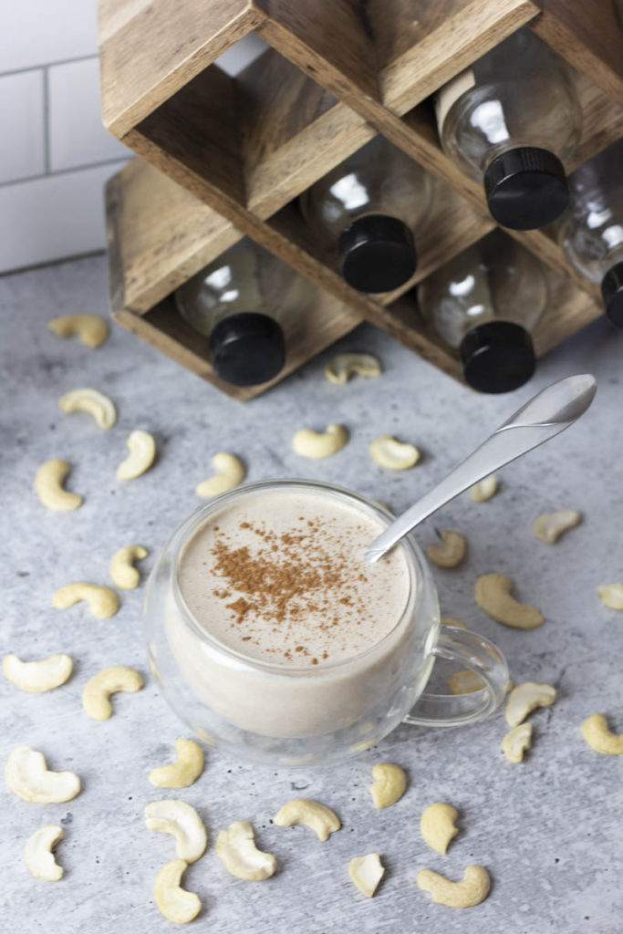 chai cashew milk with scattered cashews