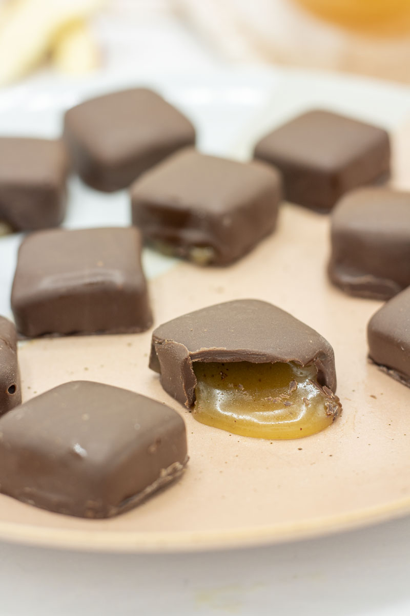 Apple cider caramels coated in milk chocolate