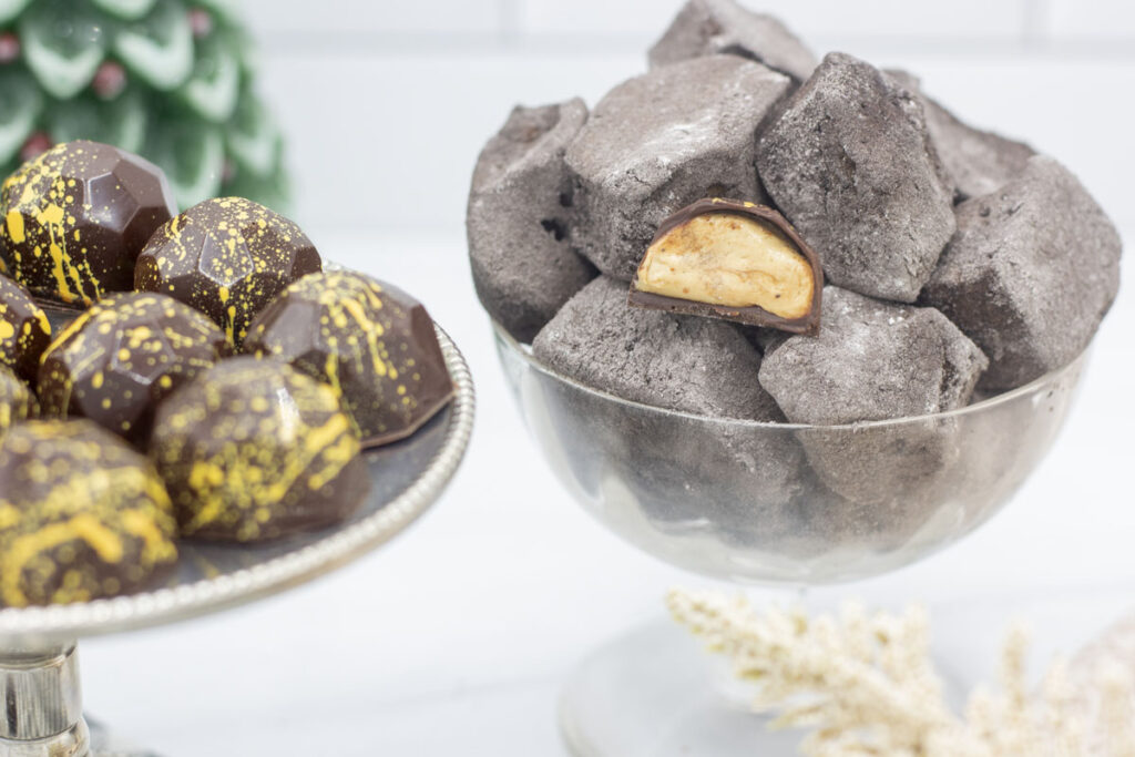 Assorted biscoff truffles on a pile of "coal" marshmallows