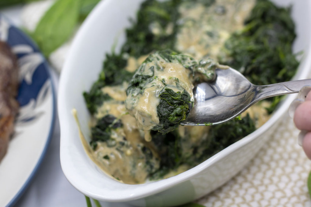 Spoonful of blue cheese creamed spinach